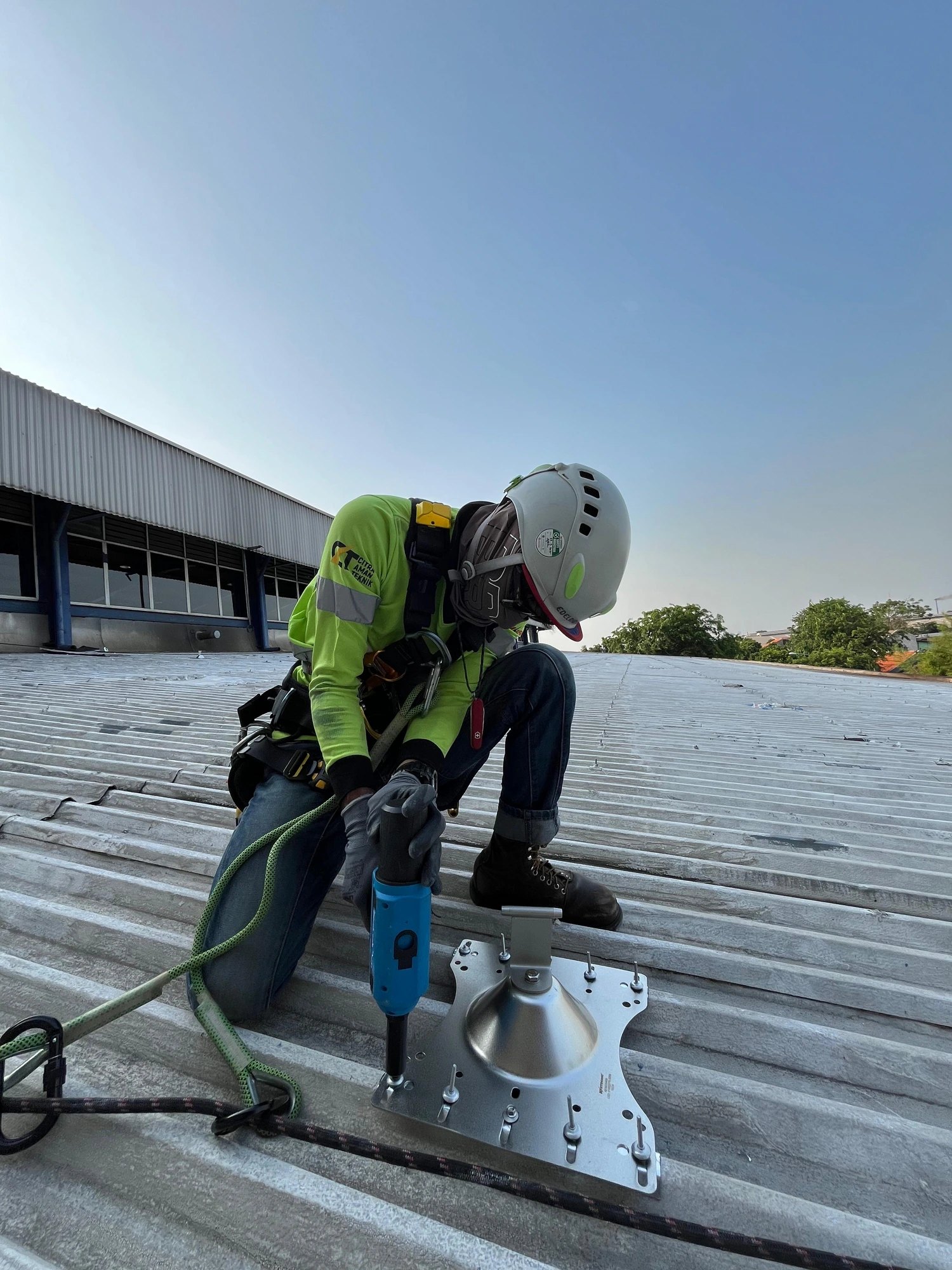Rope access technician at height