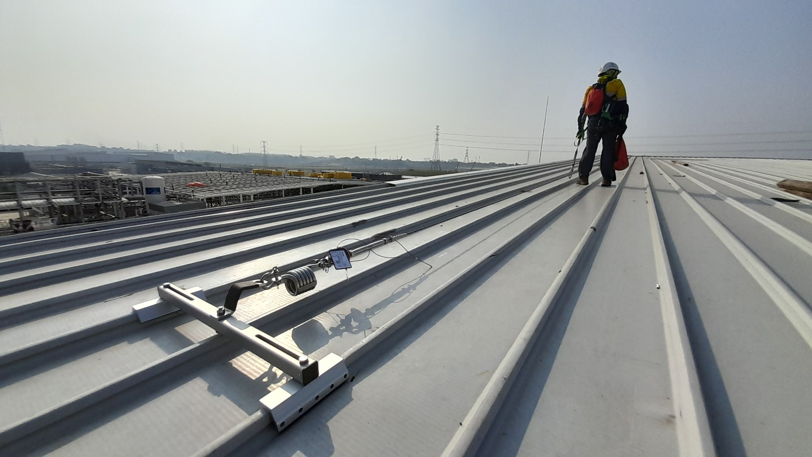 Height safety technician on rooftop